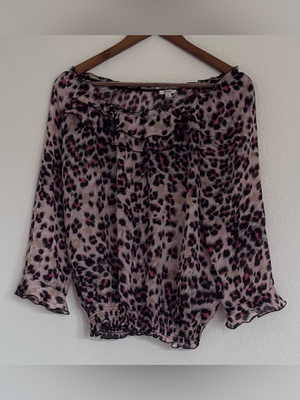 NICOLA Pink Leopard Ruffle Hem Blouse of shoulders